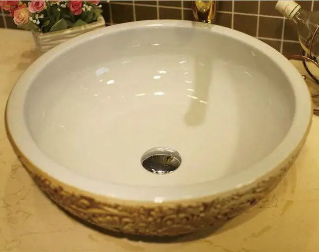 Керамическая раковина с глубоким тиснением круглая для ванной комнаты |