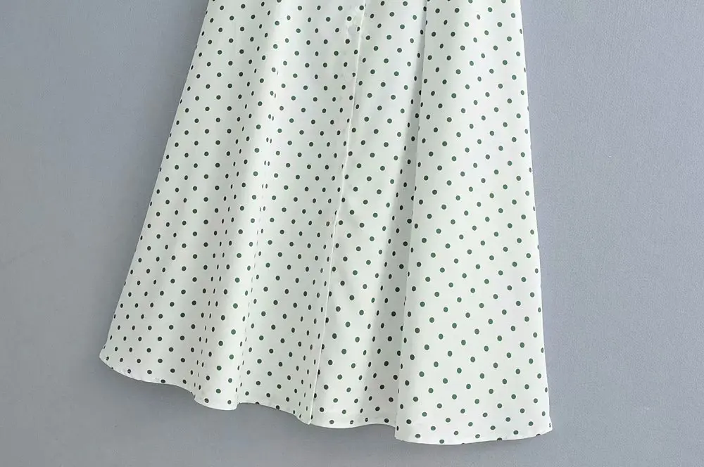 Женское платье миди в зеленый горошек с глубоким v-образным вырезом вечернее