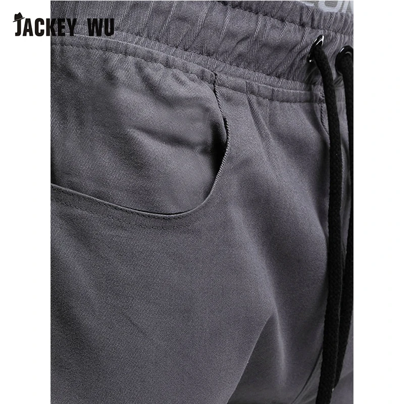 JACKEYWU Брендовые брюки для мужчин 2019 модные Лоскутные складные Джоггеры мужские
