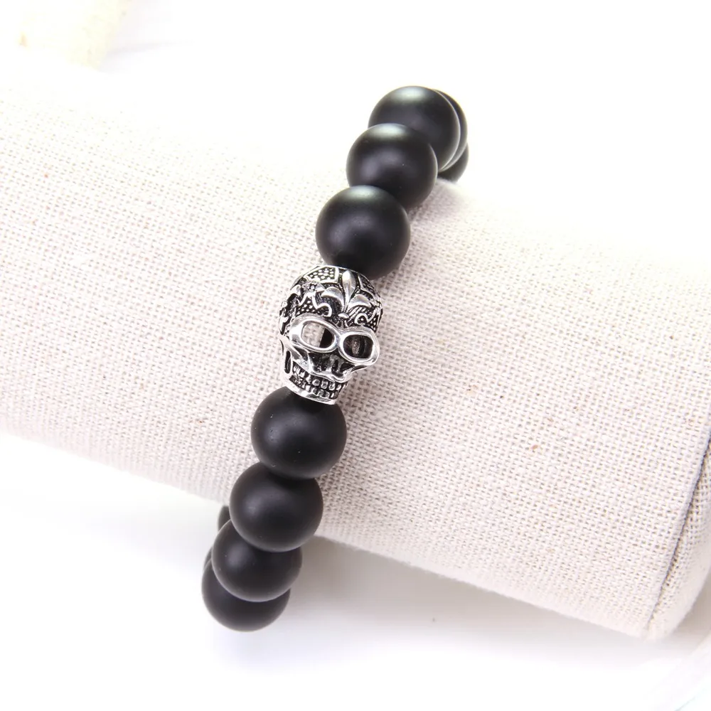 Большой черный обсидиан и череп в стиле Томаса с бусинами виде лилии эластичный