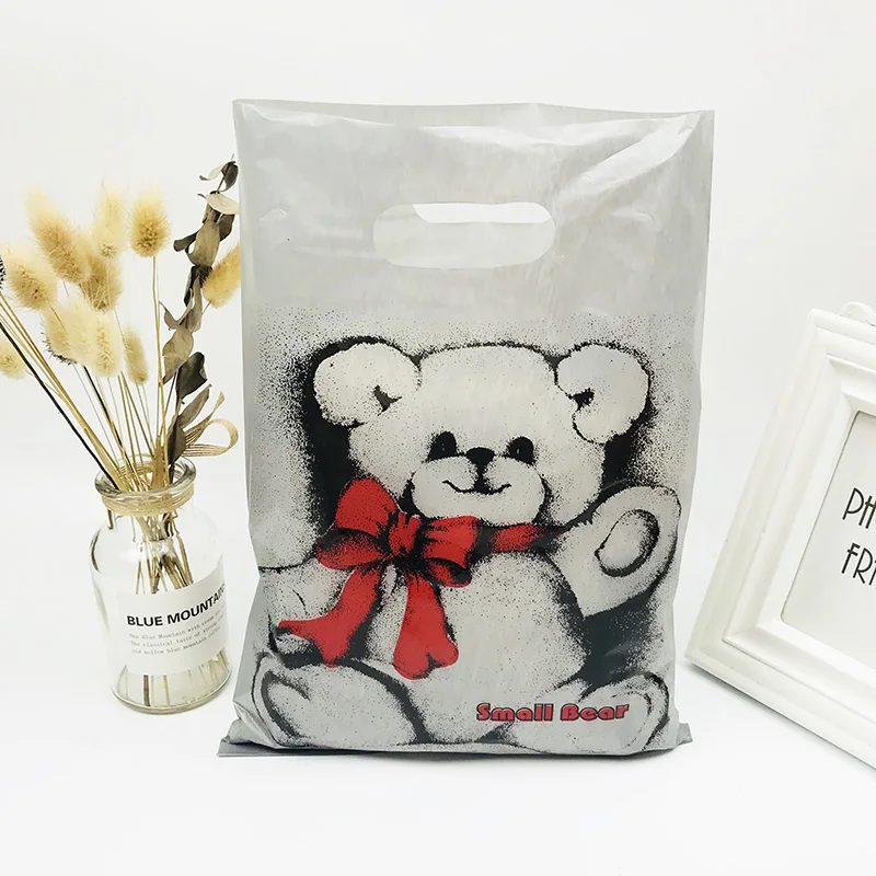 

Big Size 25x35cm Gray Bear With Red Bow Design Plastic Bag 50pcs/lot Shopping Jewelry Packaging Plastic Gift Bags With Handle