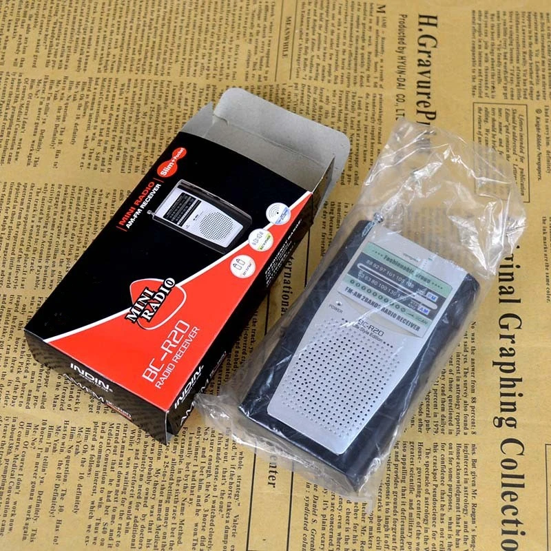 Совершенно новое портативное мини радио R20 с двухдиапазонным FM/AM карманное со