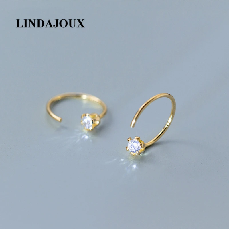 Круглые серьги гвоздики золотистого цвета с блестящим цирконием 925 пробы