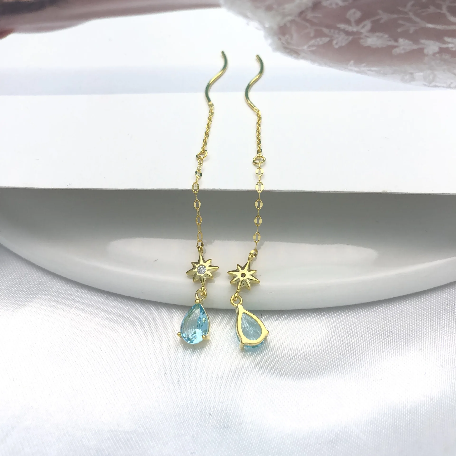 Серьги подвески женские из серебра 100% пробы с голубыми