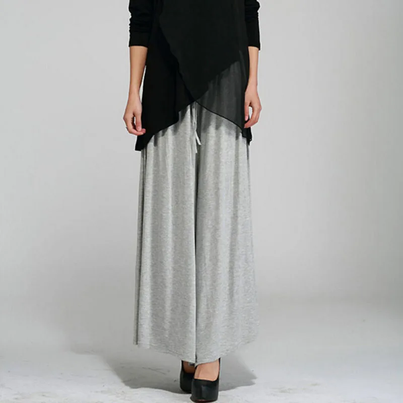 Женские летние широкие брюки однотонные свободные из модала больших размеров с