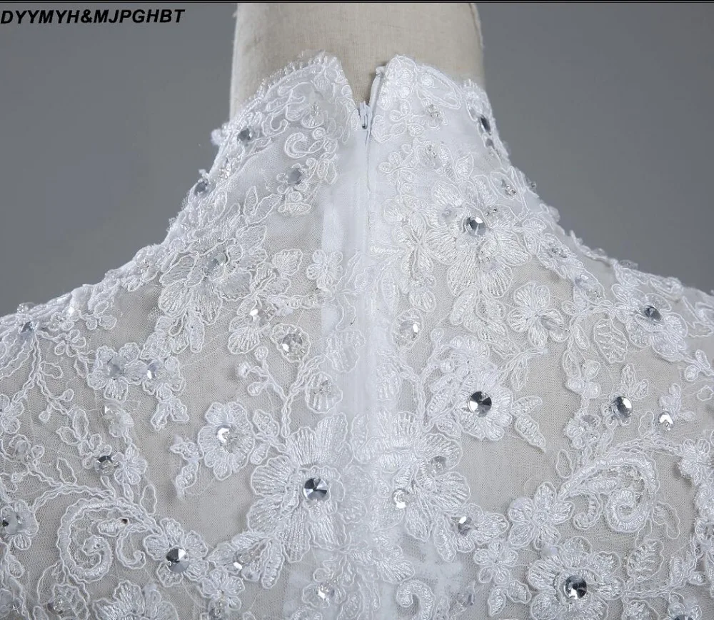 Пышные свадебные платья с высоким воротником украшенные кристаллами и кружевом
