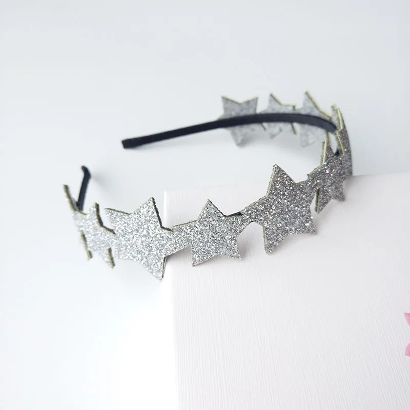 Обруч для волос детский серебристый с мерцающей пудрой и заостренными звездами| |