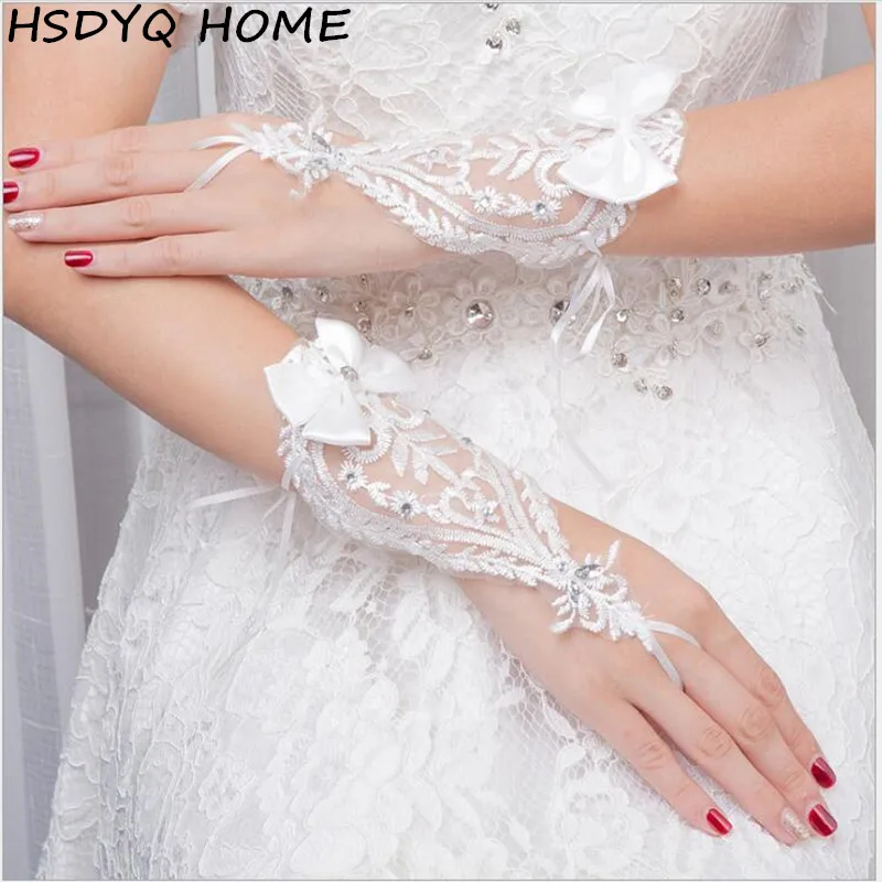 

Cheap White Gloves Elegant Write Fingerless Short Paragraph Rhinestone Bridal Wedding Gloves Wholesale Hot Sale