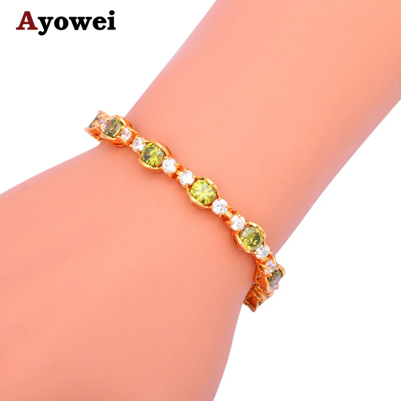 Браслеты из перидота светло зеленого цвета с кристаллами желтого золота Новое