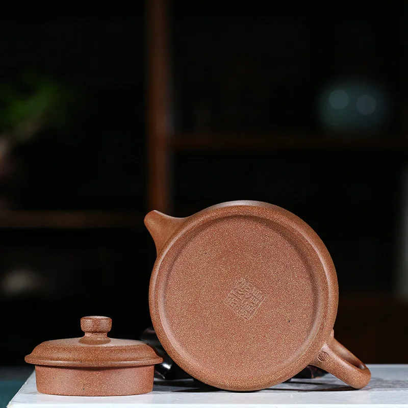 

Yixing purple clay pot genuine hand-made high-quality peach blossom mud Dezhong pot Kungfu teapot teapot Gift Set