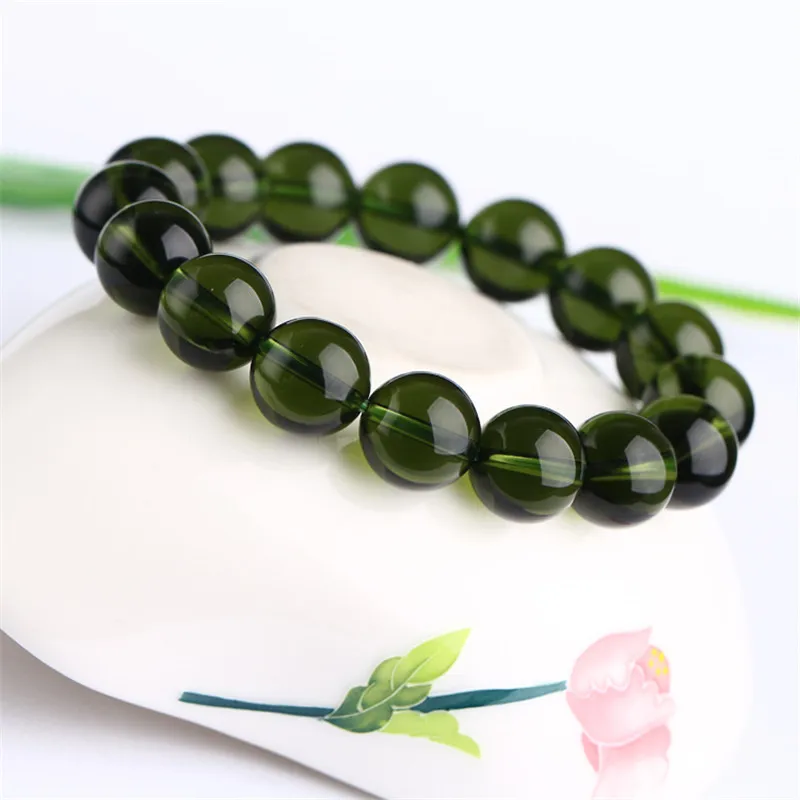 Естественный Moldavite зеленый аэролиты Чешский метеоритов с украшением в виде