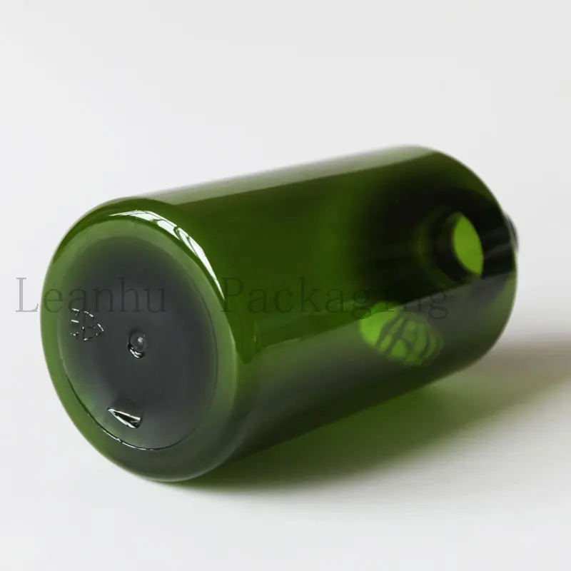 Зеленые пластиковые бутылки для шампуня с насосом лосьона многоразовый