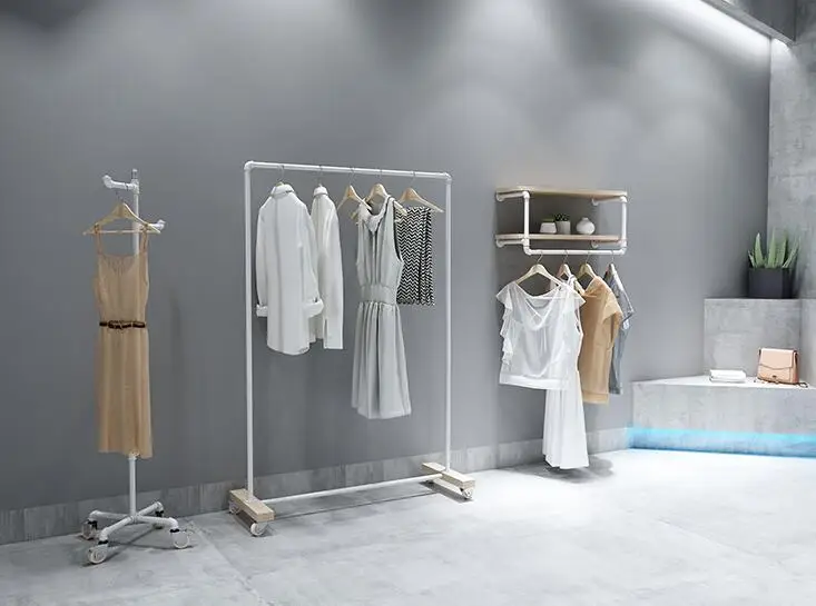 Clothing store display rack. Clothes rack women's shop floor-to-floor hangers. Solid wood Textile Gondola simple white gantry.