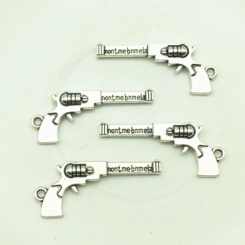 

LJJAGLL 50pcs 15*36mm Necklace Gun Pistol Charms Pendants Vintage Alloy Silver Weapon Revolver Charm Diy Jewelry Findings ASH004