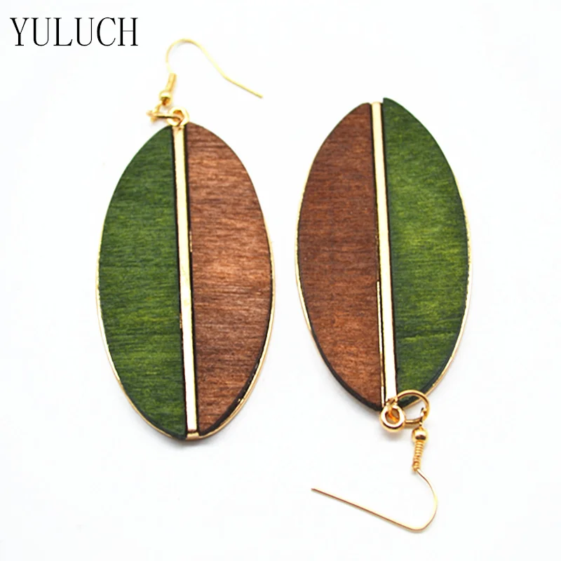Женские деревянные серьги полукруглые минималистичные в форме листьев |
