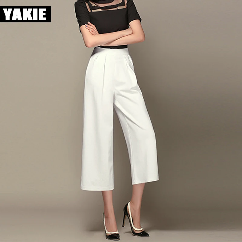 Брюки женские черные белые широкие с высокой эластичной талией в стиле пэчворк