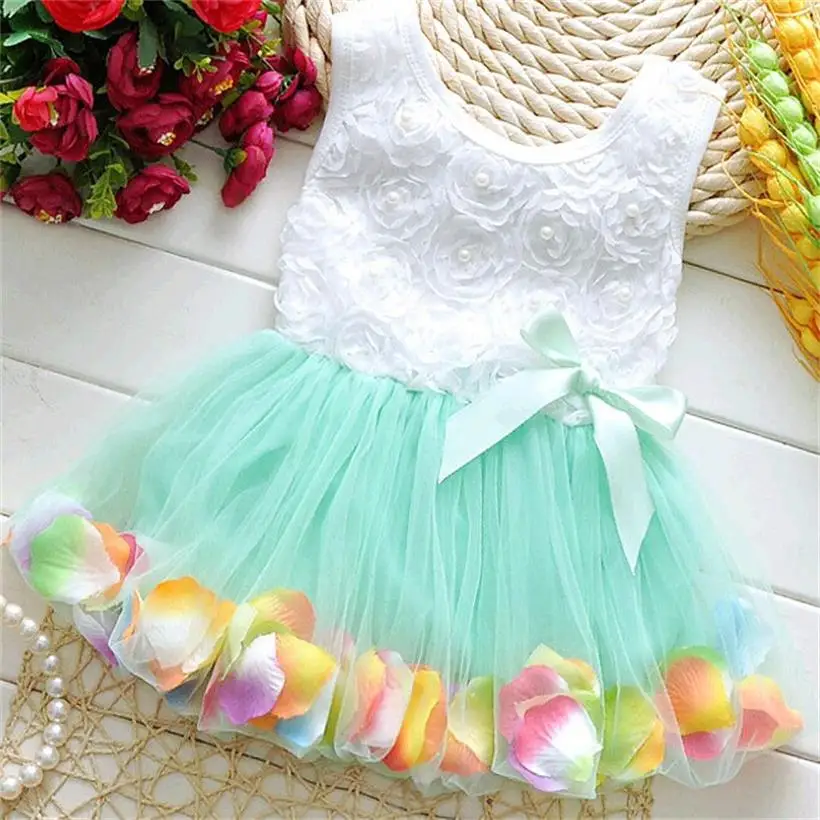 

UNIKIDS Free shipping 2016 new summer 1 2 3 y baby dress with petals cotton O-neck sleeveless baby girls dresses