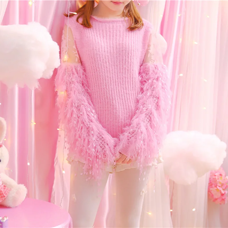 Женский вязаный пуловер TWOTWINSTYLE с круглым вырезом и рукавами-фонариками весна 2020 |