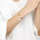 Женский браслет серебристого цвета с гравировкой, из нержавеющей стали