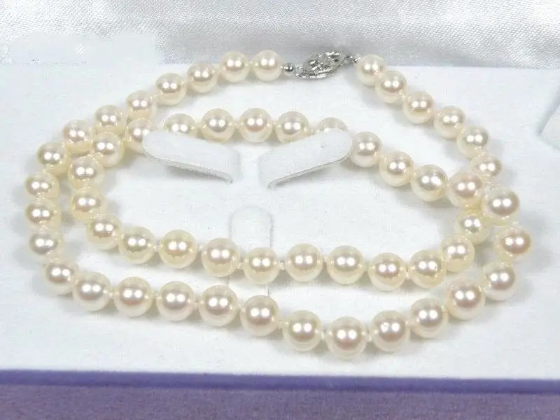 Фото Великолепное AKOYA белое ожерелье 7 5-8 мм AAA + с круглым жемчугом 14 k/20 золотая