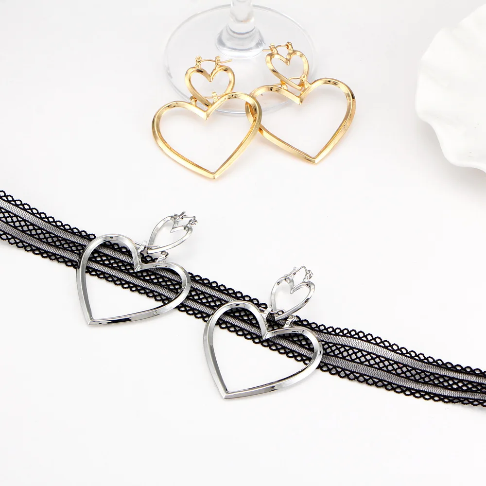 Женские серьги подвески с сердечками золотого и серебряного цвета длинные