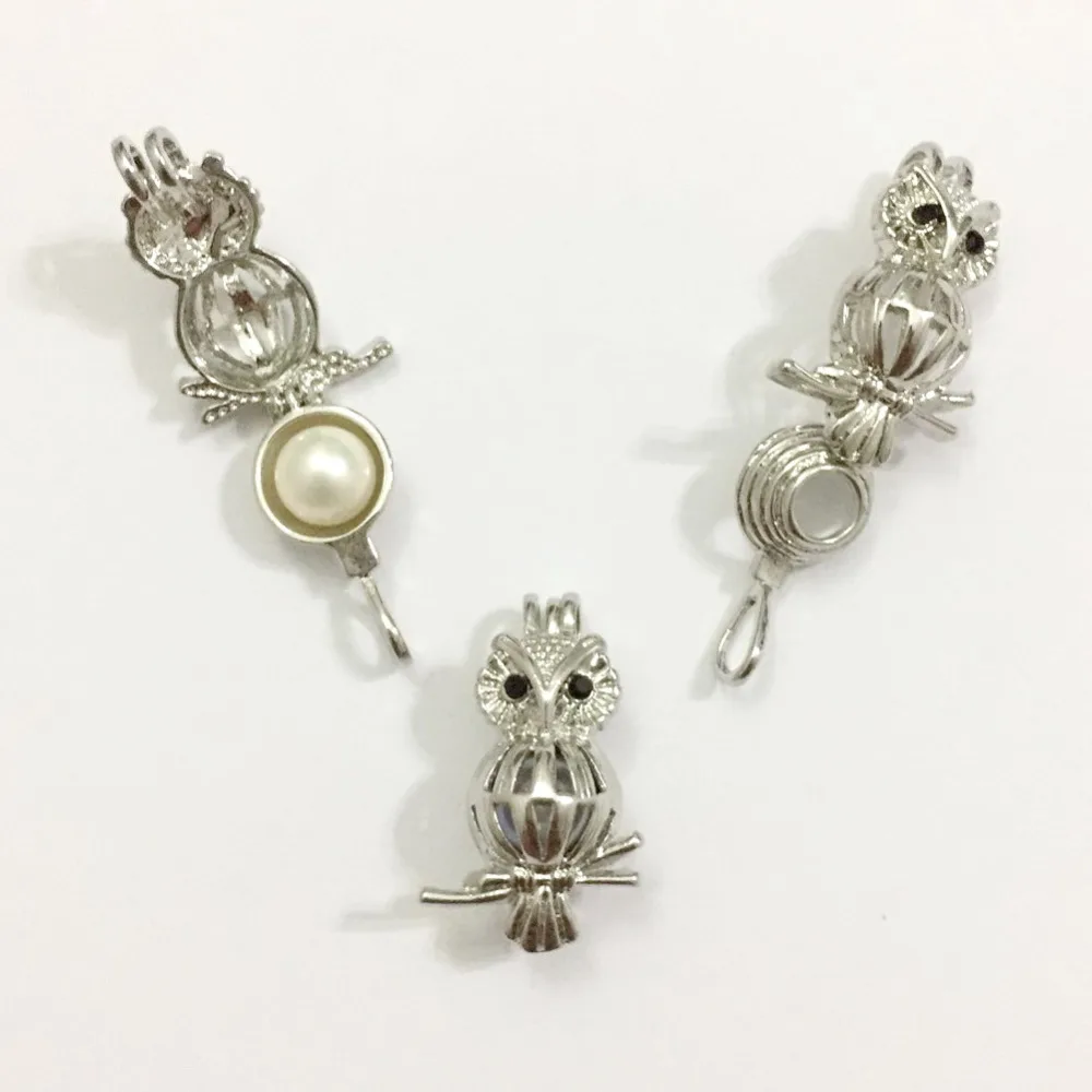 A + черный циркониевый медальон с глазами совы можно положить в жемчужные