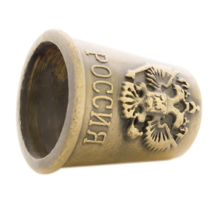 Металлические аксессуары для швейных игл. Швейные наперстки в стиле ретро.