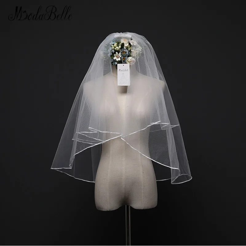 Дешевая короткая свадебная фата modabelle с гребнем из фатина ленточным краем