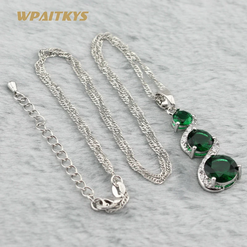 Женский комплект ювелирных изделий зеленого цвета с изумрудно белым фианитом