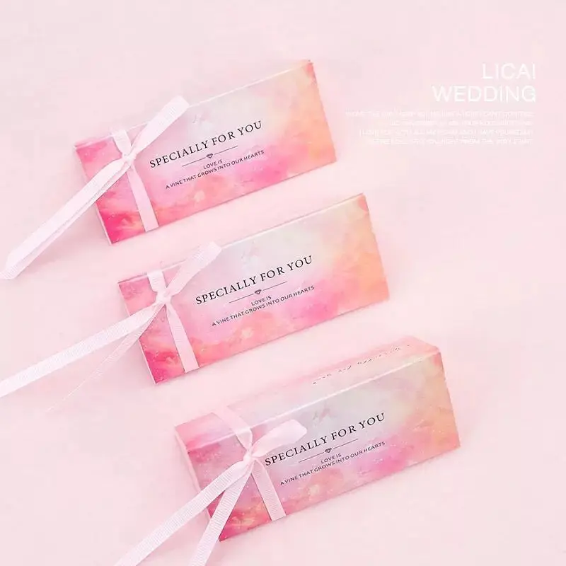 

Free Shipping 50Pcs Wedding Favor candy box 4 colors Paper sweets package feather flower blue sea green gift boxes with ribbon