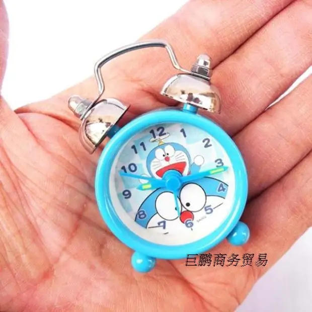 Lovely small quartz clock 202 Mini cartoon alarm button batteries get up lazy students watch table |