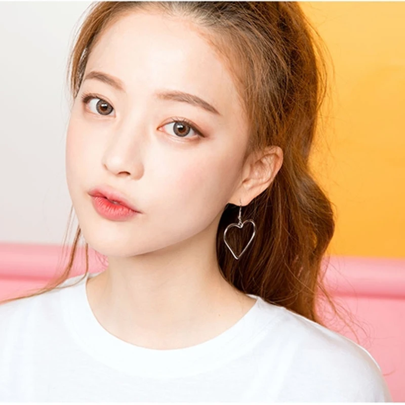 Женские серьги-Крючки с полым сердечком золотистого/серебристого цвета модные