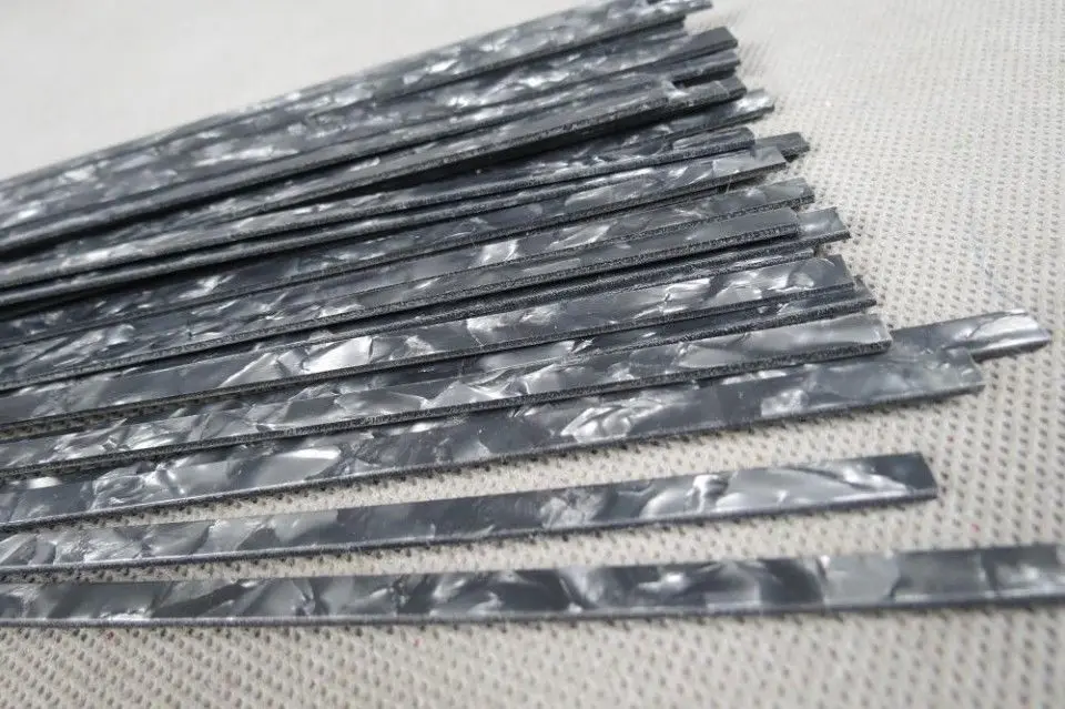 

30 полоса черный жемчужный целлулоид связывания, размеры6 мм x 1,5 мм толщиной и 1600 мм длиной