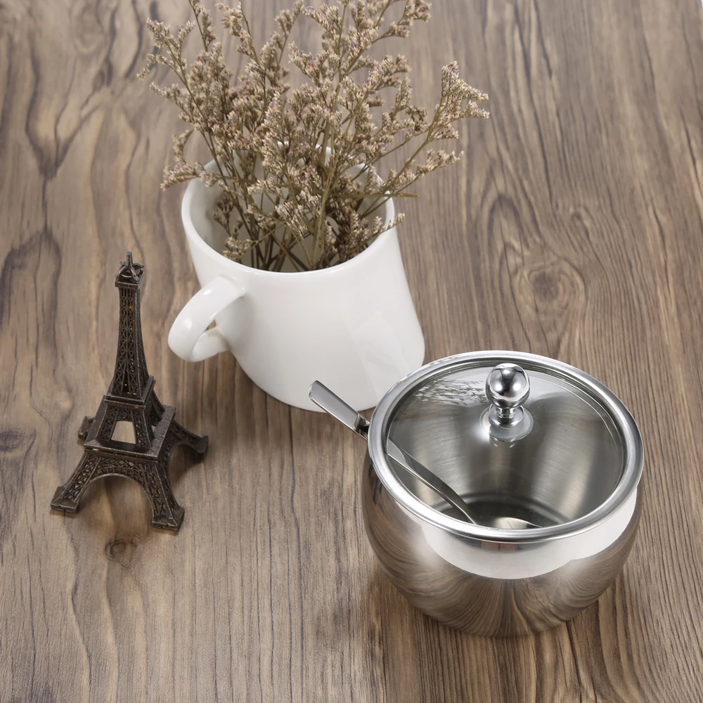 Высокая конец прочной чайная из нержавеющей стали миска с крышкой и ложка сахара