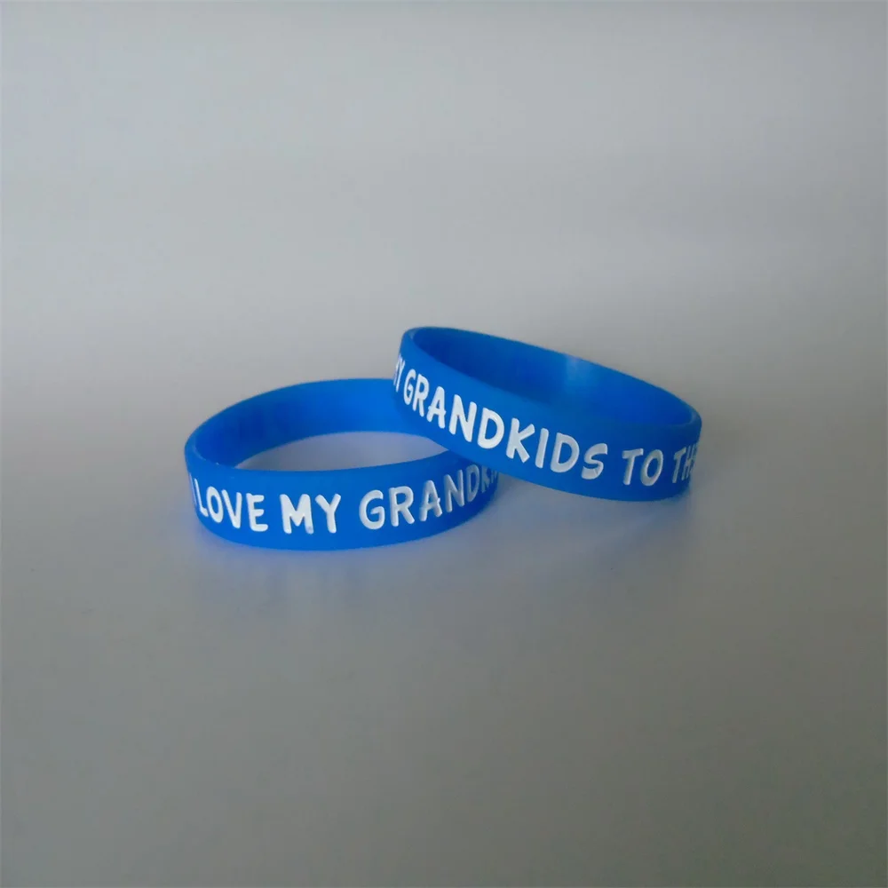 

100PCS/Lot high quality debossed and ink filled rubber wristbands for gifts Y022602