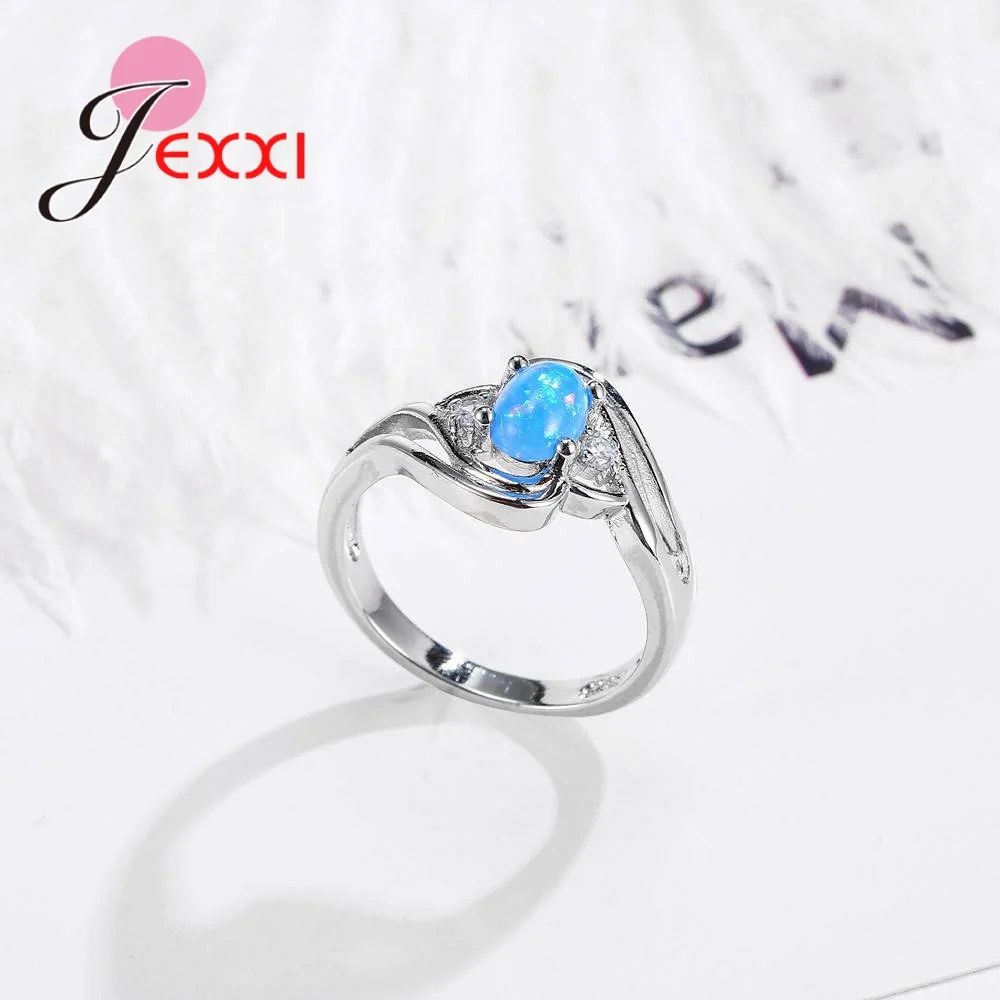 Спиральные мистические овальные камни из синего опала обручальные кольца