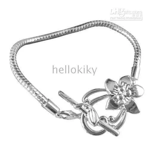 

Flower Toggle BRACELET 30 PCS SILVER PLATED WITH ALLOY CLASP AND COPPER CHAINS