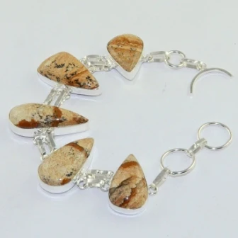 

Серебряная накладка на медный браслет, с изображением яшмы, 19,5 см, B1770