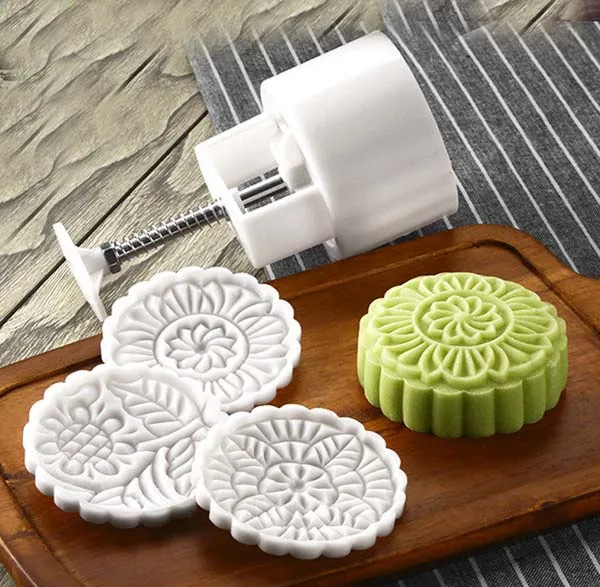 

Hand pressure moon cake mold plus head (large 150 grams -185 grams) with three flower moon cake mold