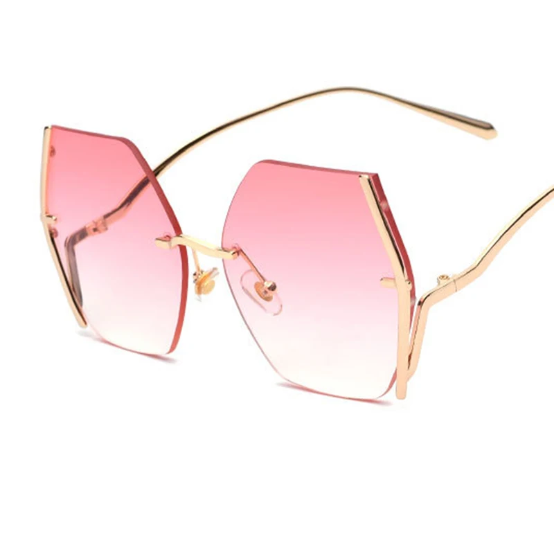 Модные женские солнцезащитные очки 2020 в большой оправе без оправы металлические