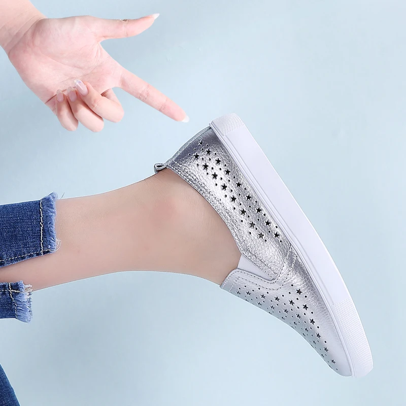 Женские кожаные кроссовки TKN белые на плоской подошве без шнуровки с резным