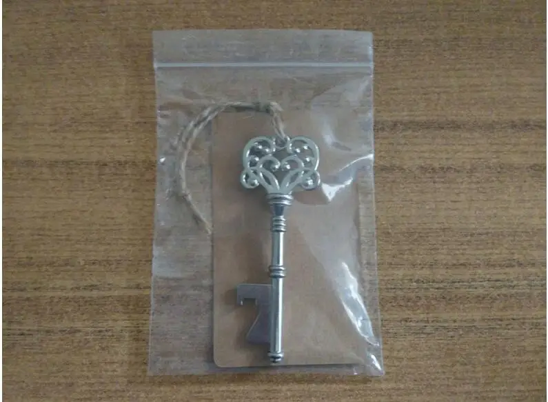 100 шт. свадебные подарки сувениры для гостей бутылка в форме черепа открывалка +