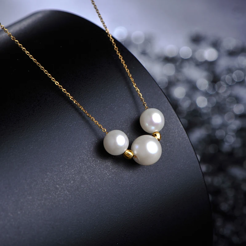 

Цепочка с подвеской из желтого золота 18 К с натуральным пресноводным жемчугом