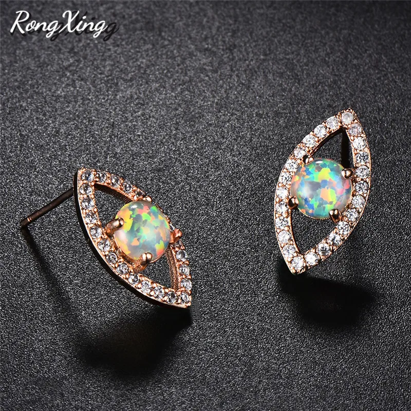 Уникальные серьги-гвоздики RongXing из розового золота с белым/синим огненным опалом