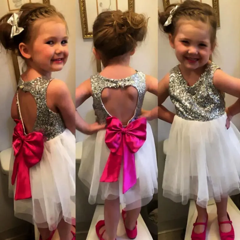 Детское платье с блестками вырезом на спине в виде сердца из фатина бантом