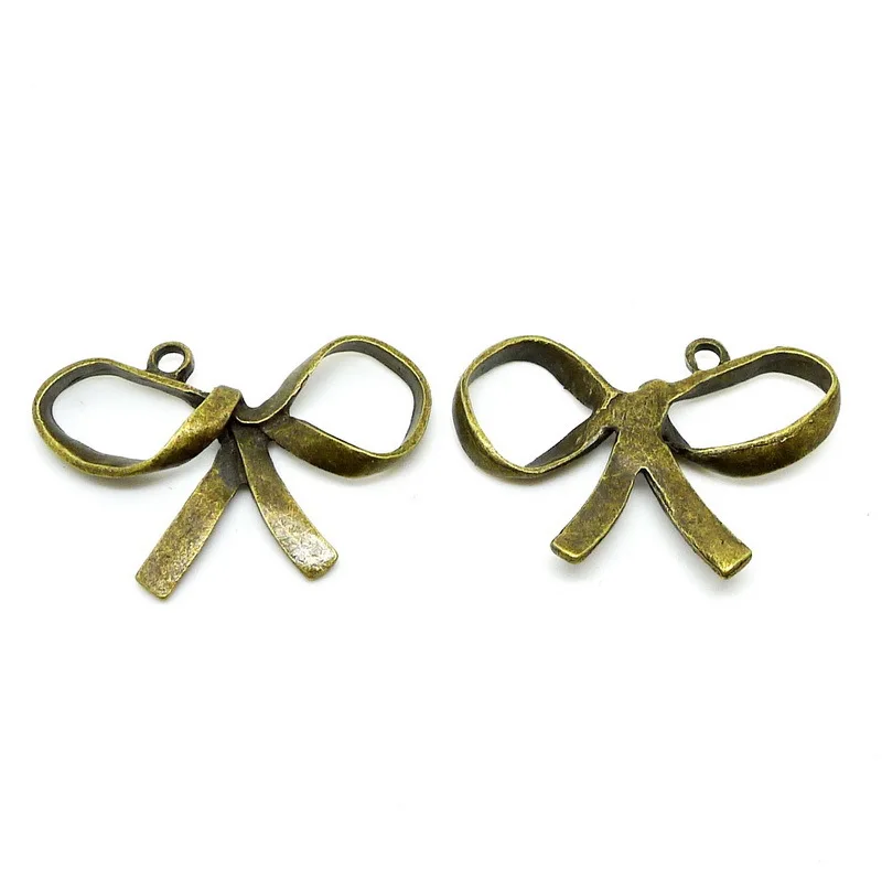 free shipping 20pcs/lot A5055 anqtique bronze bowknot shape alloy charms pendant fit jewelry making 47x32mm wholesale | Украшения и