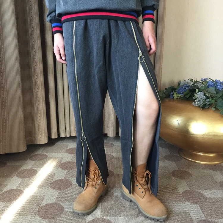 

2018 Popular logo can open the original designer brand of baggy flesh-baring harem pants Personalized sexy zipper for pants
