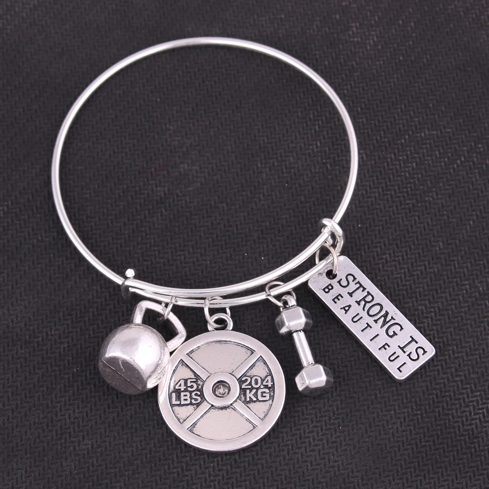 Фитнес тяжелая атлетика чайник колокольчик гантель штанга сильный красивый вы и