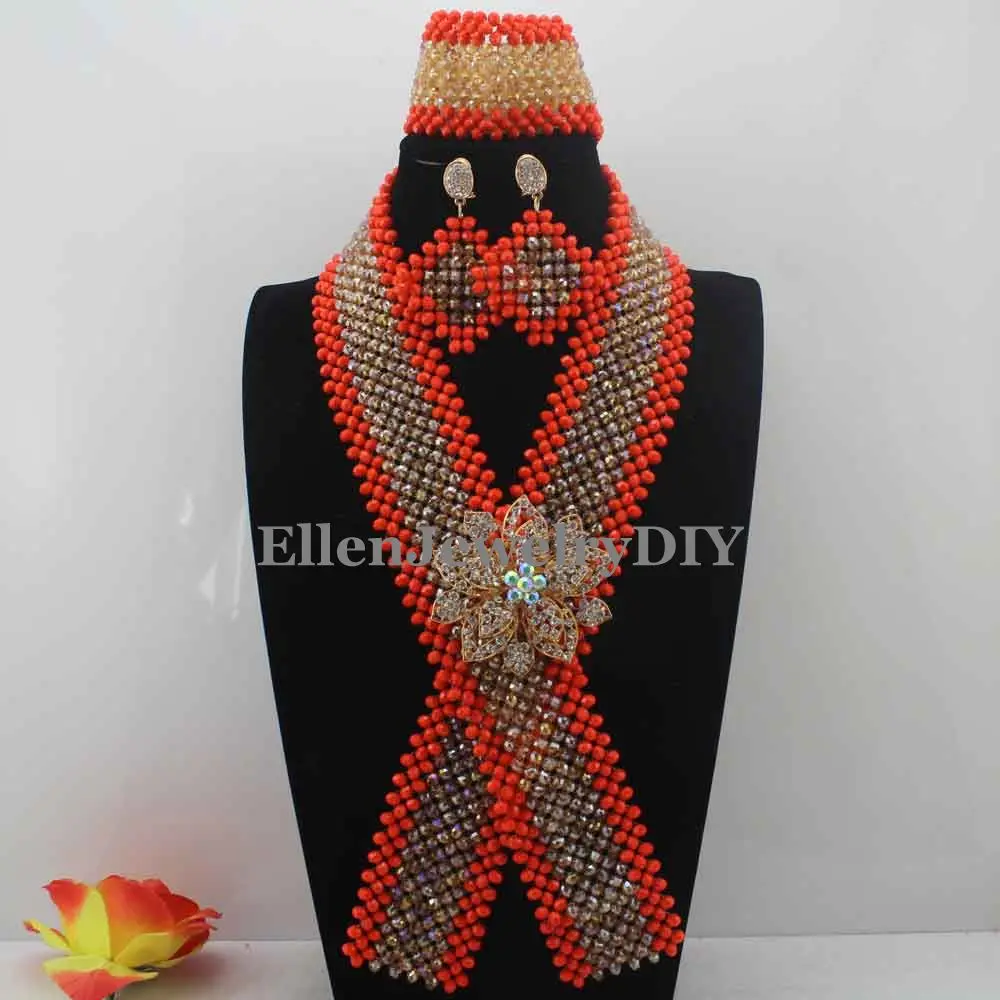 

Комплект из колье, серёг и шеи, с оранжевыми и белыми кристаллами