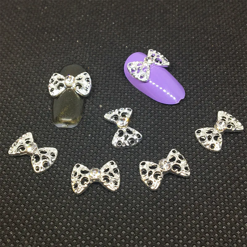 Серебристый 10Pcs Gold Silver Bow Tie Nail Art Decorations 3d Charms Diamonds Zircon Deco Nailart Supplies Cristal Design for Gel Polish Gel - Цвет: Серебристый